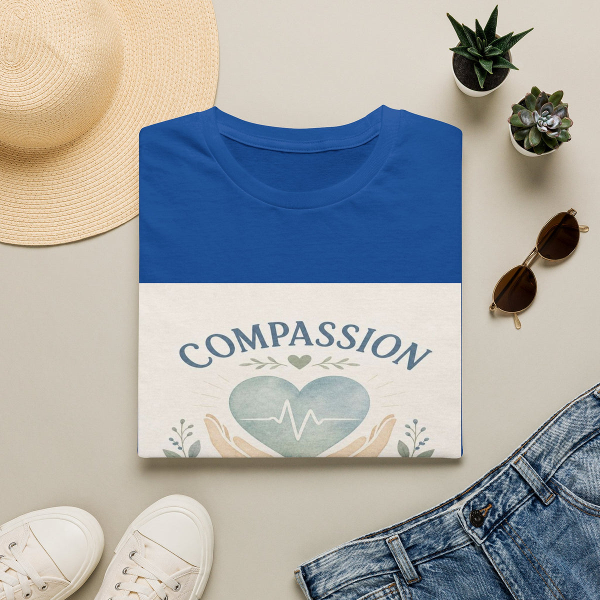 T-shirt Design Featuring Compassion Lives Here With Heart and Hands- Graphic Tees