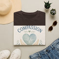 T Shirt Design Featuring Compassion Lives Here With Heart And Hands